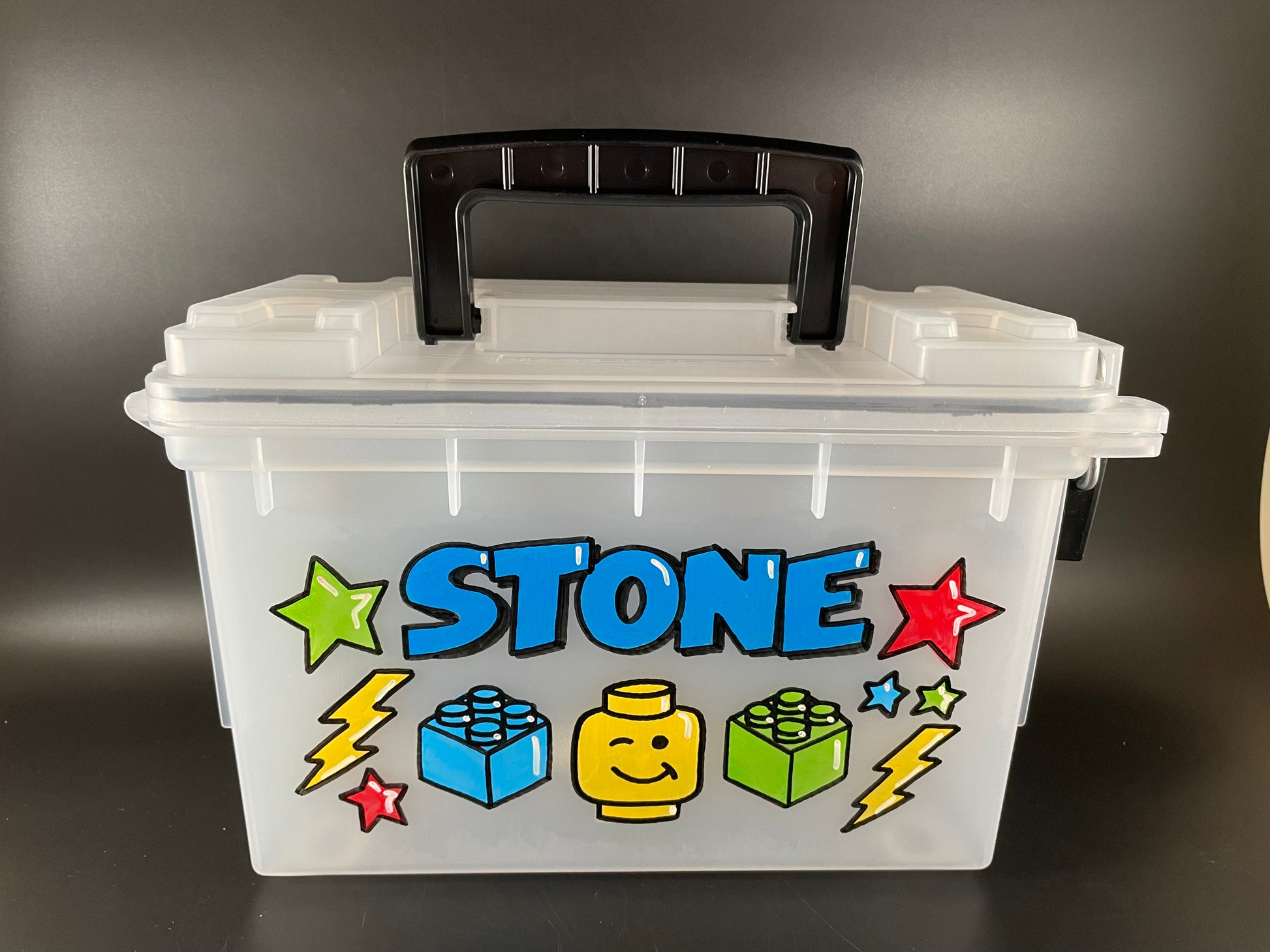 Small, hand-painted custom personalized carry case with handle - clear, front view, lego theme
